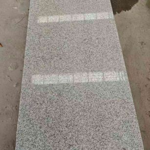 河源芝麻白光面毛板