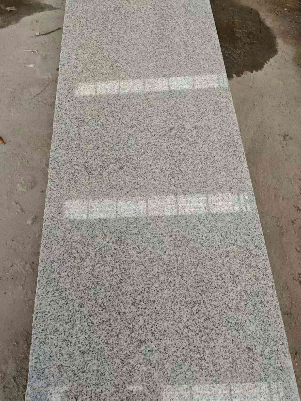 河源芝麻白光面毛板